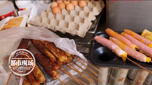 彈性蛋白酶廠家?guī)P(guān)注內(nèi)蒙古食品安全火腿腸扔地上，裹上食品添加劑后，炸了賣給學(xué)生